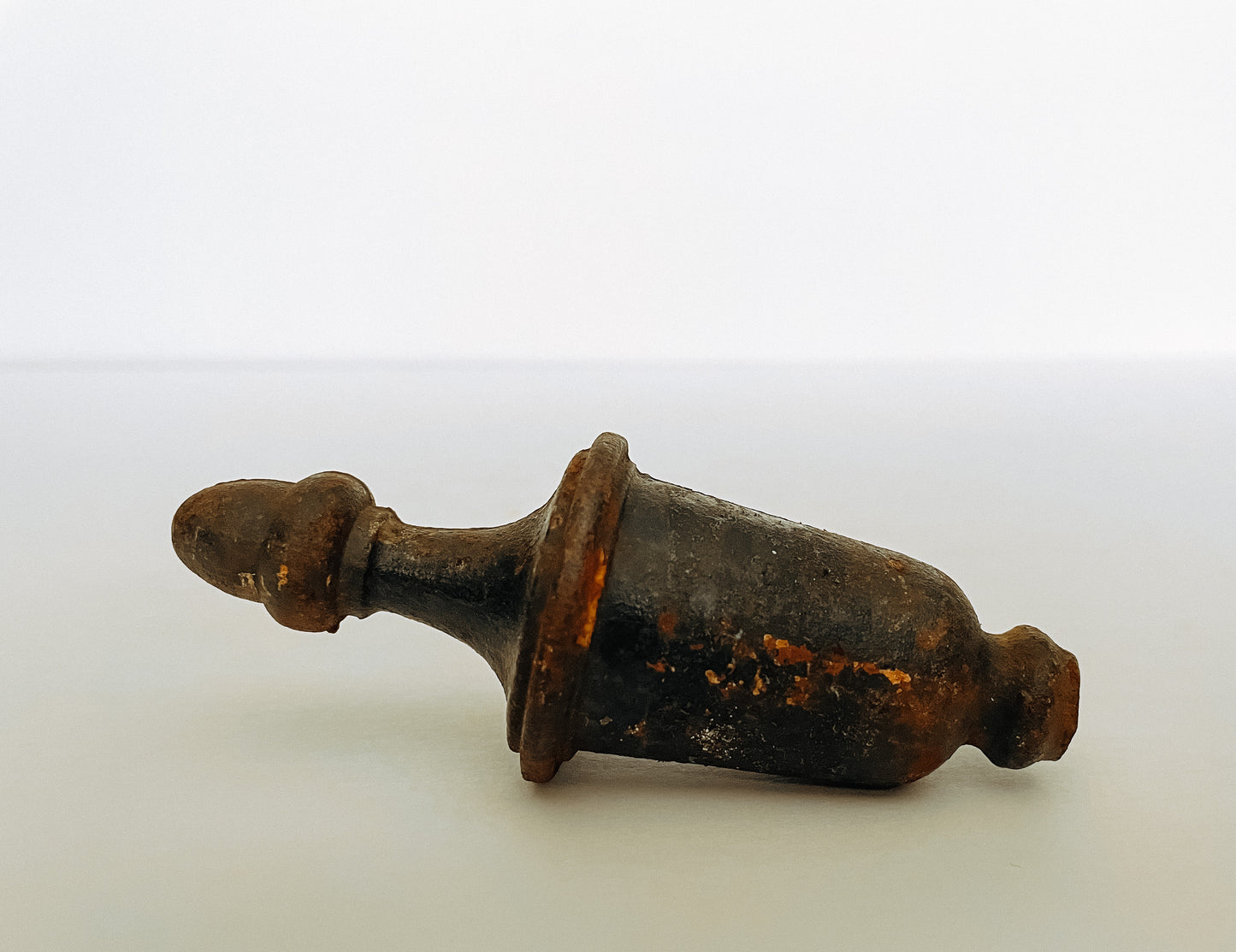 Black Rusty Plumb Bob Thingy
